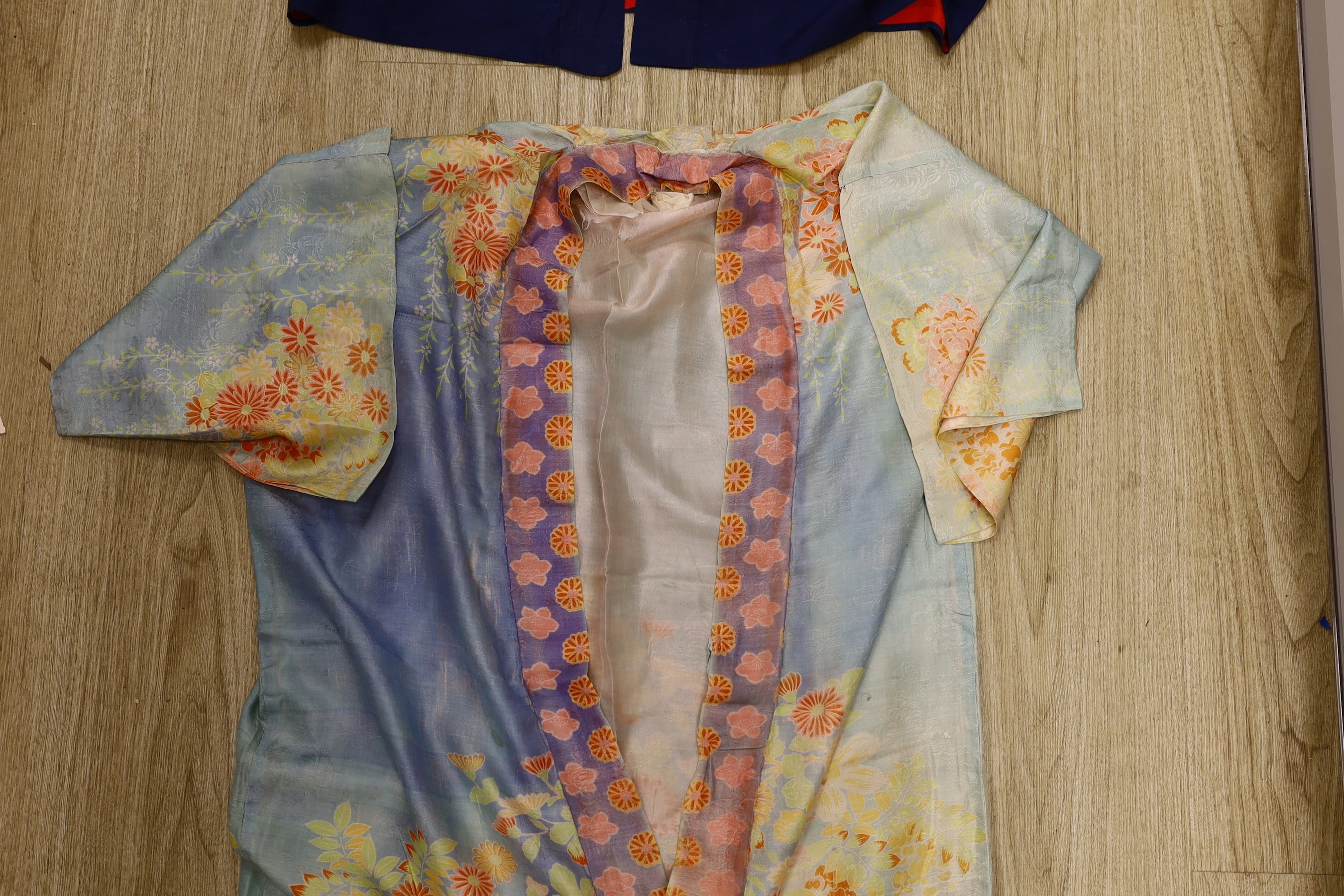 A Japanese navy blue silk kimono and another multi coloured silk ,patterned kimono from the 1930’s